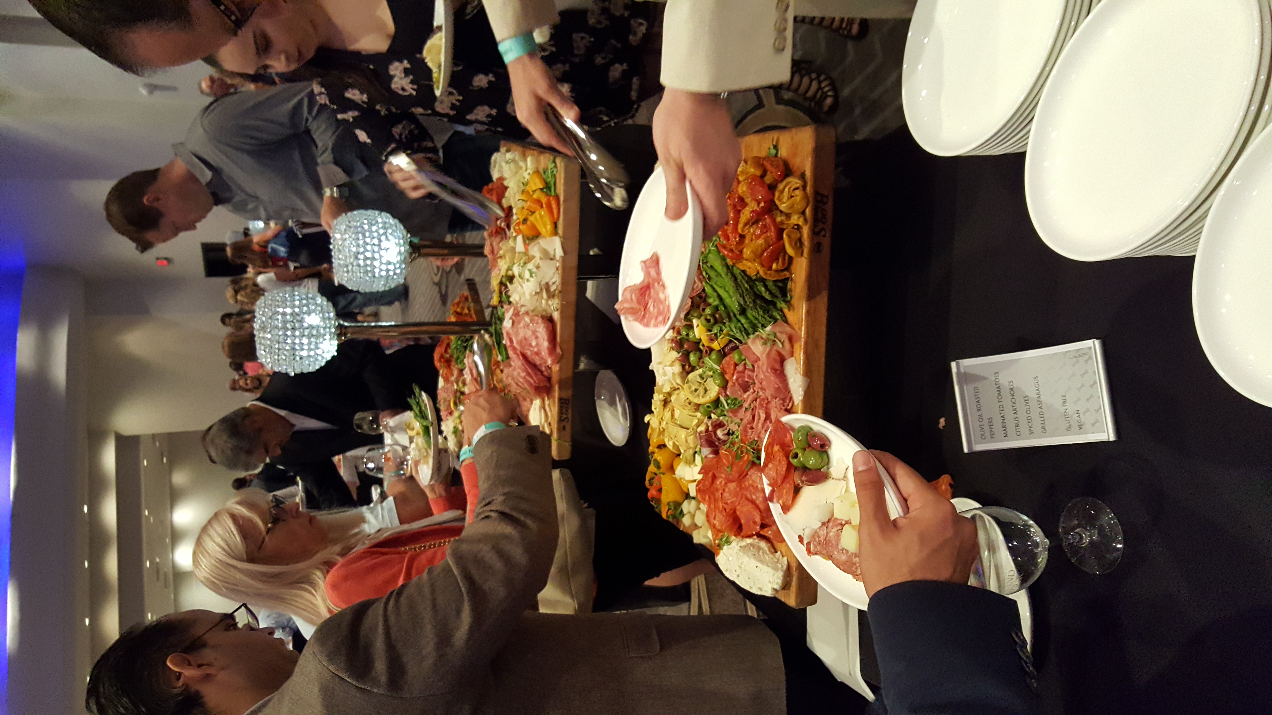 Guests gathered around a tasting table